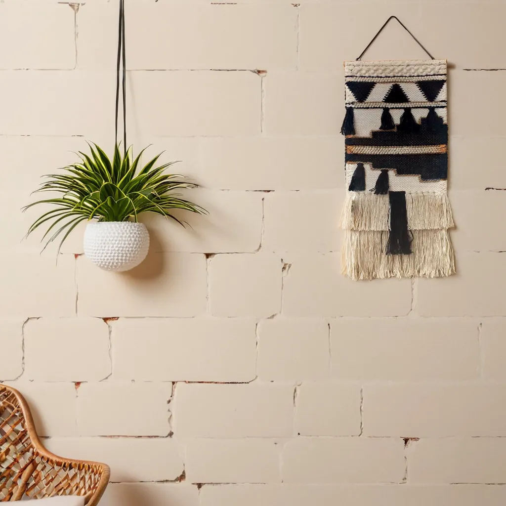 ArtistryBazaar Handwoven Tribal Wall Hanging in Wool and Jute with Geometric Patterns and Tassel Accents for Modern Boho Decor
